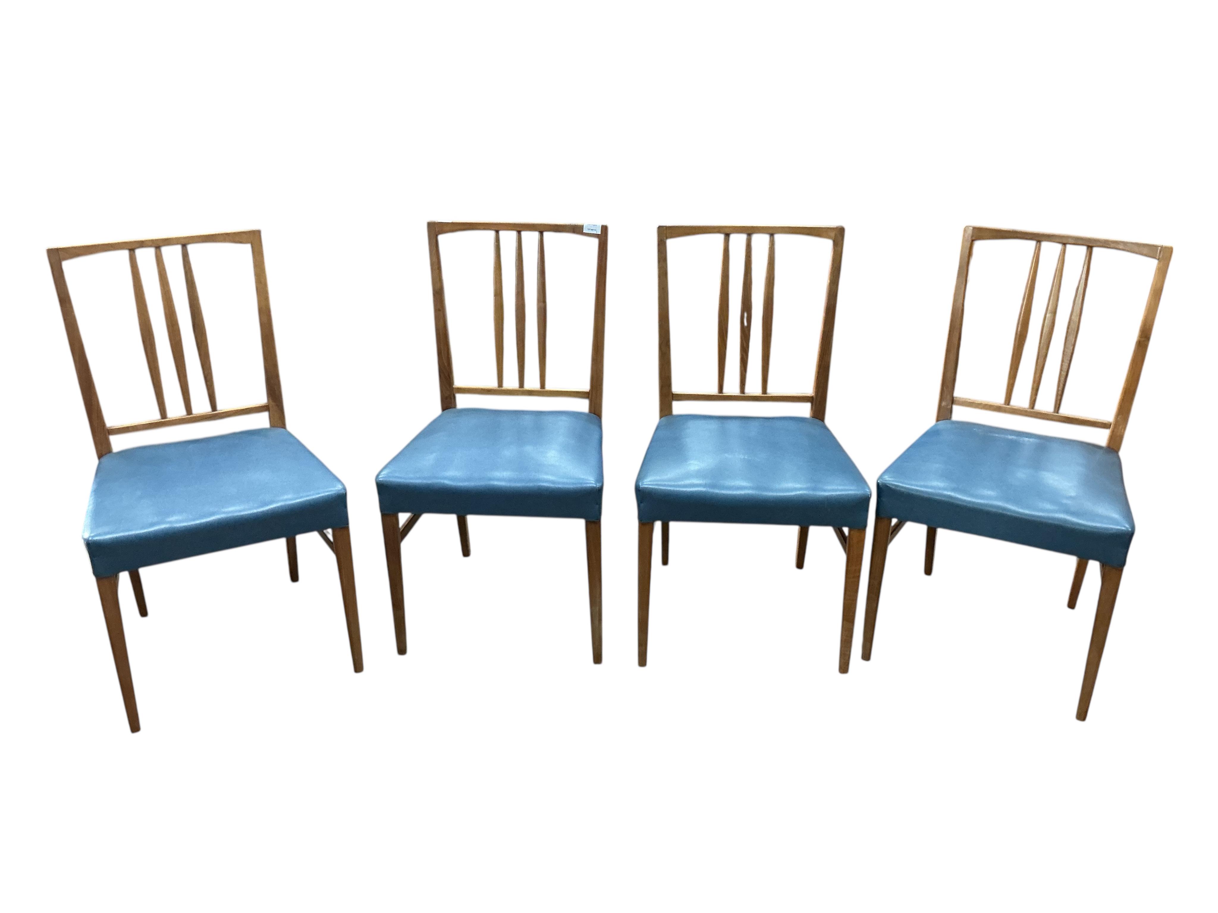 A set of four Gordon Russell mid century teak dining chairs, width 46cm, depth 44cm, height 85cm
